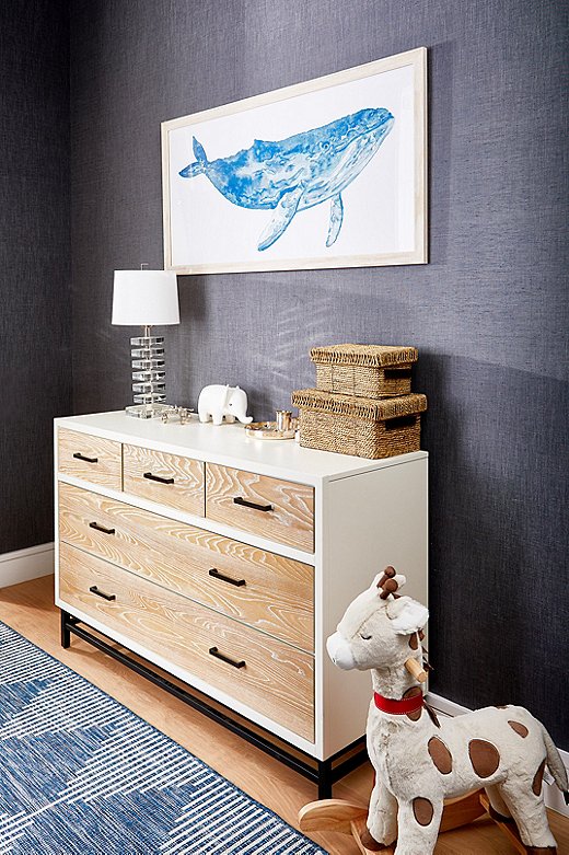 Most of the furnishings in the nursery, such as the Persephone Outdoor Rug, are just as well suited for a “big girl’s” room. Find the whale print here.
